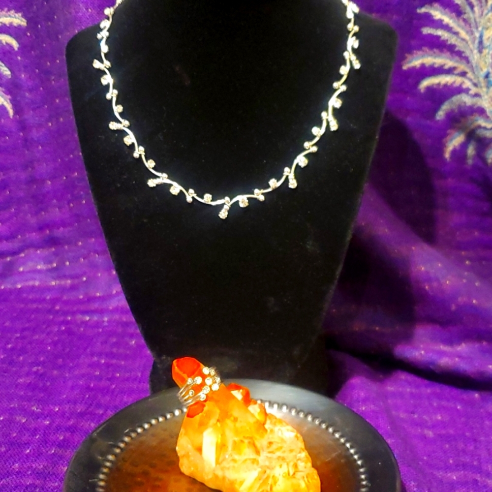 Silver toned necklace and ring